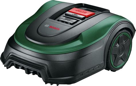 Robot tondeuse Bosch Indego 1300 en action sur une pelouse