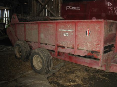 Publicité vintage d'un épandeur à fumier McCormick