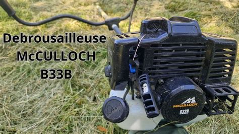 Vue d'ensemble de la débroussailleuse thermique McCulloch B33B sur un terrain herbeux