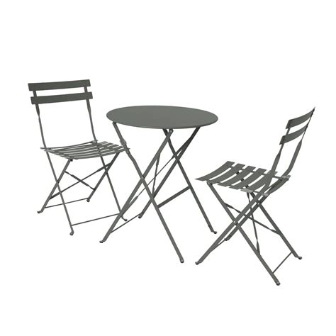 Petit jardin avec une table de bistrot et des jardinières graphiques