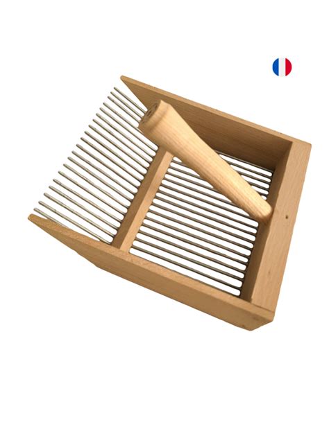 Illustration montrant l'utilisation correcte d'un peigne à myrtilles