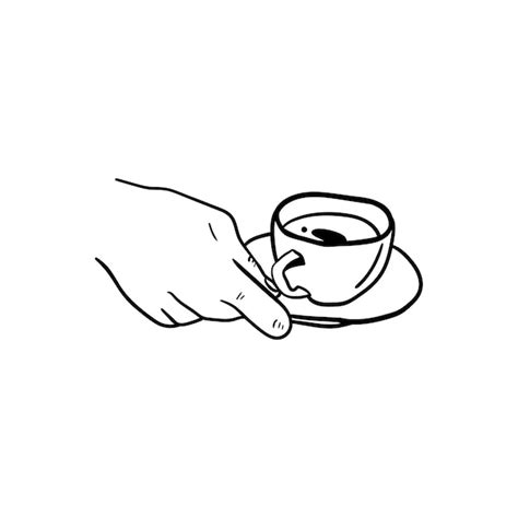 Main tenant une tasse de café, motifs de marc de café sur le fond