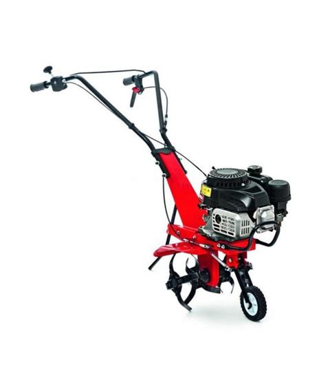 Vue d'ensemble d'une motobineuse thermique MTD dans un jardin potager