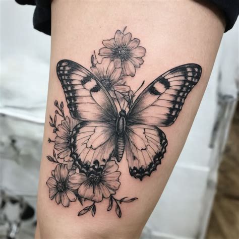 Exemple de tatouage de cactus avec des éléments western (chapeau de cow-boy, bottes)