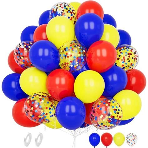 Table décorée avec vaisselle Minions et ballons jaunes et bleus