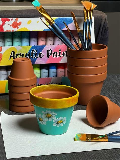 Atelier de customisation de pots en terre cuite