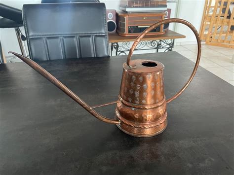 Arrosoir en cuivre ancien