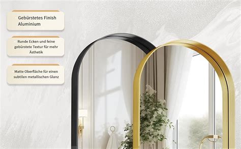 Exemple d'une entrée minimaliste avec un miroir ovale à cadre noir
