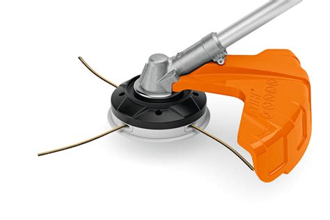Schéma technique d'une tête faucheuse STIHL avec indication du sens d'enroulement du fil