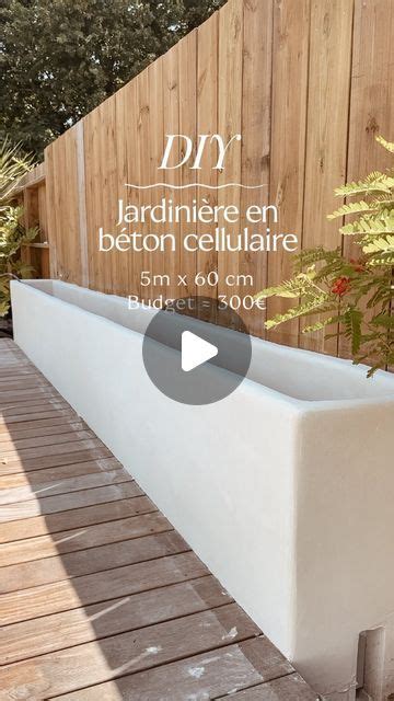 Exemple de jardinière en béton cellulaire avec finition enduite et plantes grasses