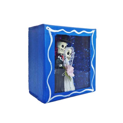 Petite boîte vitrée avec figurine de mariés mexicains