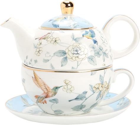 Théière et tasse d'infusion colorée