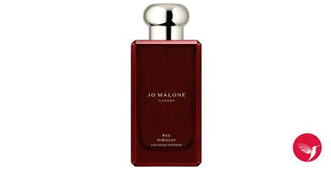 Bouteille de parfum Jo Malone London Red Hibiscus avec un fond tropical