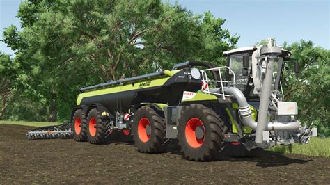 Claas Xerion Saddle Trac avec cuve d'épandage